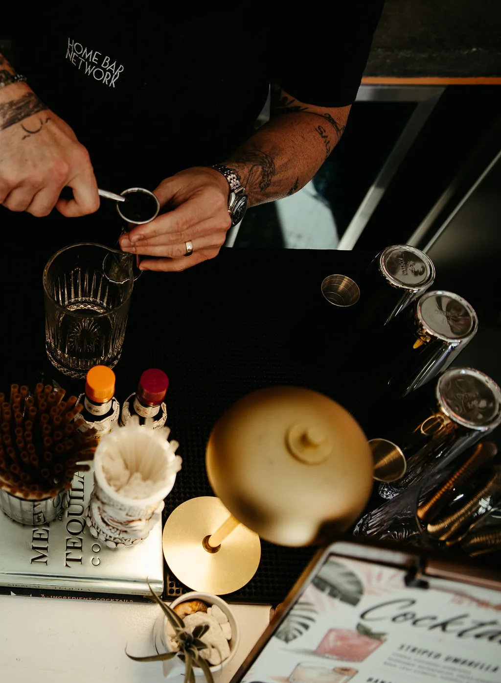 A bartender crafting cocktails at a THRIVE event