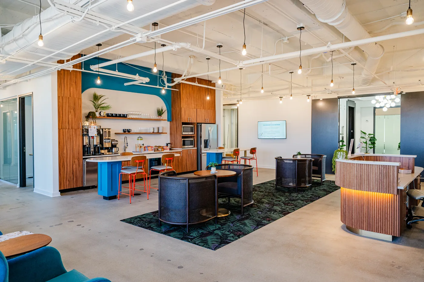 Open coworking floor and reception at THRIVE