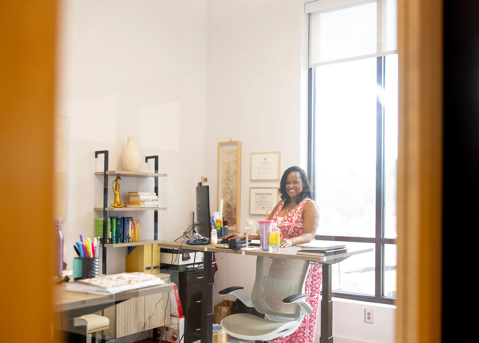 A member working in her private office at THRIVE