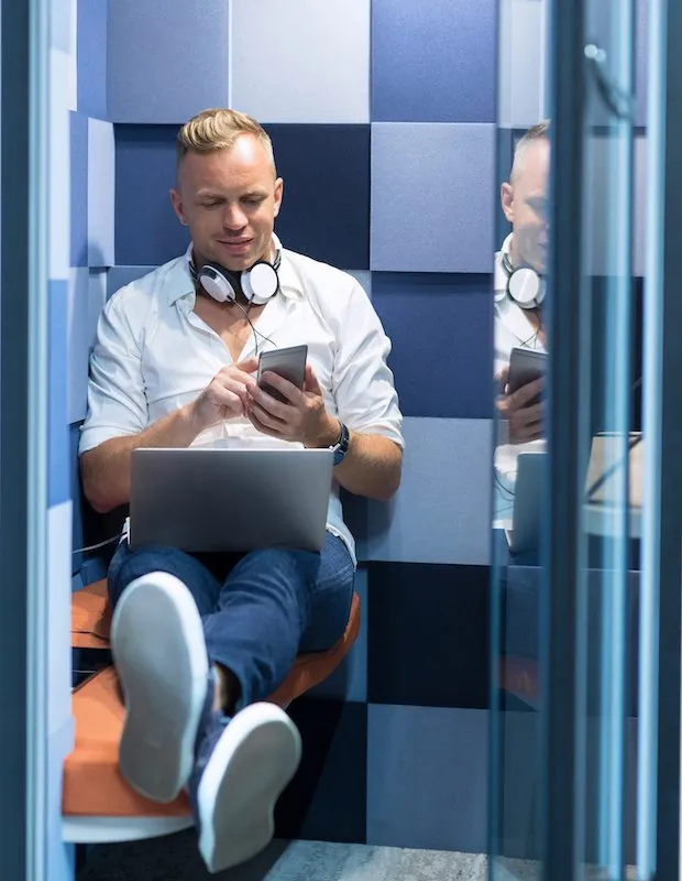Coworking spaces often provide phone booths